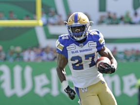 CP-Web.  Winnipeg Blue Bombers running back Johnny Augustine carries the ball during first half CFL action against the Saskatchewan Roughriders in Regina on Sunday, September 1, 2019. THE CANADIAN PRESS/Mark Taylor ORG XMIT: MT104