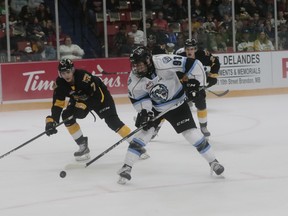 Winnipeg Ice forward Matt Savoie takes a backhand shot in the first period.The Ice won 3-2 in their opener. (Sandy Black photo)
