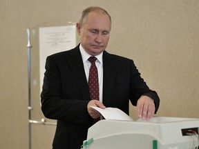 Russia's President Vladimir Putin casts his ballot at a polling station during the Moscow city parliament election in Moscow, Russia September 8, 2019. Sputnik/Alexei Nikolsky/Kremlin via REUTERS  ATTENTION EDITORS - THIS IMAGE WAS PROVIDED BY A THIRD PARTY. ORG XMIT: MOS