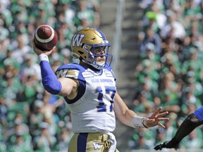 Blue Bombers quarterback Chris Streveler attempts a pass during the first half against the Roughriders in Regina on Sunday. Streveler threw for just 161 yards on the heels of an 86-yard performance one week earlier. (THE CANADIAN PRESS)