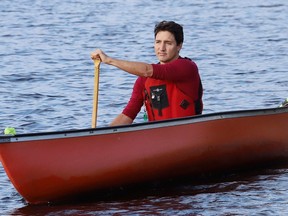 Federal Liberal leader Justin Trudeau canoes around Lake Laurentian during a campaign stop at the Lake Laurentian Conservation Area in Sudbury, Ont. on Thursday, Sept. 26, 2019. (John Lappa/Sudbury Star/Postmedia Network)