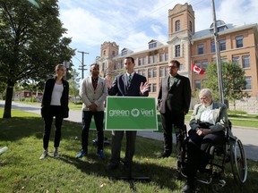Green Party of Manitoba leader James Beddome (centre) speaks about scrapping the education property tax during a media event at Earl Grey School in the Fort Rouge neighbourhood of Winnipeg on Wed., Sept. 4, 2019. From left are party organizer Mel Hiebert, deputy leader of the Green Party of Ontario Abhijeet Manay, Wolseley candidate David Nickarz and Notre Dame candidate Martha Jo Willard. Kevin King/Winnipeg Sun/Postmedia Network