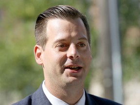 Green Party of Manitoba leader James Beddome speaks about scrapping the education property tax during a media event at Earl Grey School in the Fort Rouge neighbourhood of Winnipeg on Wed., Sept. 4, 2019.