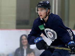 Ville Heinola calls for the puck during Winnipeg Jets rookie camp at Bell MTS Iceplex in Winnipeg on Thurs., Sept. 5, 2019.
