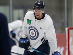 David Gustafsson grimaces after taking a spill during Winnipeg Jets rookie camp at Bell MTS Iceplex in Winnipeg on Thurs., Sept. 5, 2019. Kevin King/Winnipeg Sun/Postmedia Network