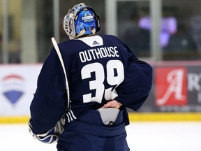 Goaltender Griffen Outhouse adjusts his jersey during Winnipeg Jets rookie camp at Bell MTS Iceplex in Winnipeg on Thurs., Sept. 5, 2019. Kevin King/Winnipeg Sun/Postmedia Network