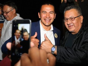 Leader Wab Kinew mugs for cameras with supporters after his concession speech at the Manitoba New Democratic Party election night headquarters at the Metropolitan Entertainment Centre in Winnipeg on Tues., Sept. 10, 2019. Kevin King/Winnipeg Sun/Postmedia Network
