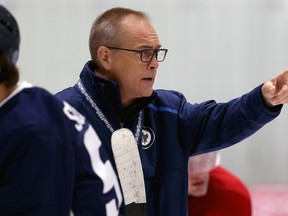 Head coach Paul Maurice gives instructions during Winnipeg Jets training camp at Bell MTS Iceplex on Sunday.