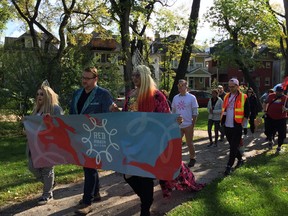 Marchers take part in the Red Ribbon Walk and Run on Sunday, at Vimy Ridge Memorial Park in Winnipeg. The Red Ribbon Walk and Run is a crucial annual event that raises funds for people living with HIV in Manitoba and takes a stand against HIV stigma. Funds raised go directly towards Nine Circles Community Health Centre’s programs and services to help people living with HIV thrive. The event included a 2km walk and 5km run through the West End neighbourhood, free activities, and live music.