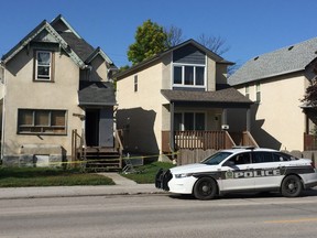 A police cruiser sits outside a residential building in the 500 block of Balmoral Street on Sunday, Sept. 22, 2019, where Winnipeg Police were called on Saturday, Sept. 21, 2019, at approximately 4:30 p.m., for the report of an injured female. Upon arrival, police said officers located a deceased adult female inside the building. It is the 29th homicide in Winnipeg in 2019.