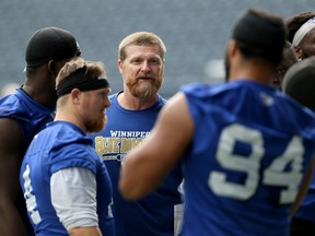 Head coach Mike O'Shea works with the defence during Winnipeg Blue Bombers practice on Tues., Sept. 24, 2019. Kevin King/Winnipeg Sun/Postmedia Network