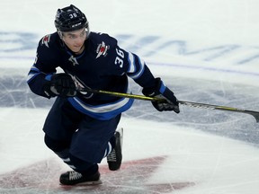 Winnipeg Jets defenceman Ville Heinola skates during NHL pre-season action against the Edmonton Oilers at Bell MTS Place in Winnipeg, last Thursday. The 18-year-old rookie defenceman has earned a new number and a spot on the roster, at least for now.
