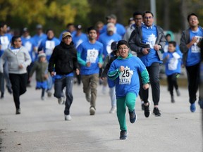 Members of Winnipeg's Ahmadiyya Muslim Jama'at community held a fundraising walk and run on Saturday at St. Vital Park to help support the efforts of the CancerCare Manitoba Foundation.