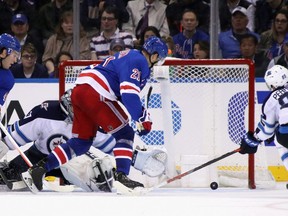 New York Ranges' Brett Howden scores the game-winning goal against the Winnipeg Jets on Thursday night. (GETTY IMAGES)