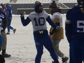 Winnipeg Blue Bombers players including slotback Nick Demski 10) prepare for Saturday's game against the Montreal Alouettes, on Friday.
