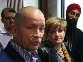 City of Winnipeg Coun. Shawn Nason, addresses the media regarding a motion that will come to council on Oct. 24 to support the opposition to Quebec's Bill 21 as Coun. Janice Lukes and Simarpreet Singh look on at Winnipeg City Hall on Wednesday, Oct. 16, 2019. Josh Aldrich/Winnipeg Sun/Postmedia