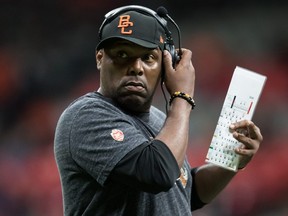 Lions head coach DeVone Claybrooks adjusts his headset during second half CFL action against the Redblacks in Vancouver, on Sept. 13, 2019.