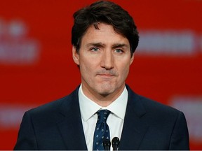 Liberal leader and Canadian Prime Minister Justin Trudeau stands on stage after the federal election at the Palais des Congres in Montreal, Quebec, Canada October 22, 2019.