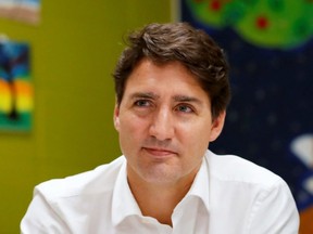 Liberal leader Justin Trudeau meets teachers during an election campaign visit to Ottawa on Monday, Oct. 7, 2019.