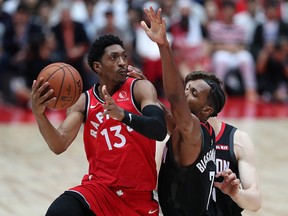 Malcolm Miller of the Toronto Raptors drives to the basket against Jaron Blossomgame of the Houston Rockets during their preseason game at Saitama Super Arena on October 8, 2019 in Saitama, Japan. (Takashi Aoyama/Getty Images)