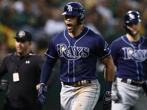 Rays' Tommy Pham celebrates after his solo home run in the fifth inning of the American League Wild Card Game against the Athletics at RingCentral Coliseum in Oakland, Calif., on Wednesday, Oct. 2, 2019.