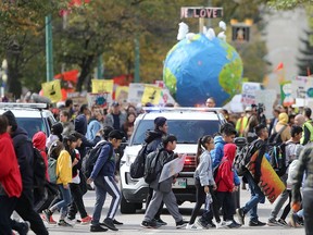 Several thousand people attended an anti climate change  event in Winnipeg on Friday, Sept. 27, 2019. They marched up and down Broadway Avenue. Chris Procaylo/Winnipeg Sun/Postmedia Network