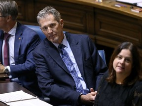 Premier Brian Pallister takes his seat following the throne speech before the Legislative Assembly of Manitoba on Monday.