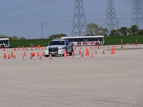 Members of the Winnipeg media are put through their paces at the Winnipeg Police Service driver training facility at West St. Paul, just outside Winnipeg on Monday. The Winnipeg Police Service hosted a Traffic Division road safety open house with the purpose to provide media with first-hand experience of the key enforcement activities that the traffic division focuses on and why. The specific areas to be covered were distracted driving as well as speeding.