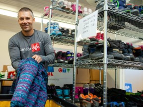 Volunteers for the United Way Winnipeg Koats for Kids program in Winnipeg sort and organize wintert coats and other cold weather gear for the 2019 campaign. COVID-19 has changed many of the ways Koats for Kids operates this year including contactless drop-off for donors, professional cleaning of coats and ski pants for recipients, and enhanced cleaning and distancing protocols for volunteers.