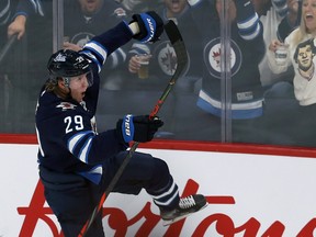 Winnipeg Jets forward Patrik Laine celebrates his second-period goal against the Minnesota Wild during NHL action in Winnipeg on Thurs., Oct. 10, 2019. Kevin King/Winnipeg Sun/Postmedia Network