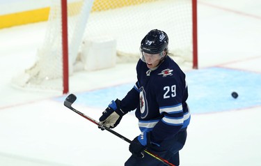 Winnipeg Jets forward Patrik Laine scores an empty-net goal against the Minnesota Wild in Winnipeg on Thurs., Oct. 10, 2019. Kevin King/Winnipeg Sun/Postmedia Network