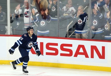 Winnipeg Jets centre Jack Roslovic celebrates his third-period goal against the Minnesota Wild during NHL action in Winnipeg on Thurs., Oct. 10, 2019. Kevin King/Winnipeg Sun/Postmedia Network