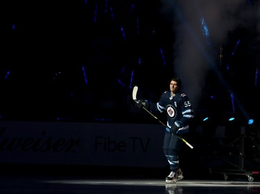 Winnipeg Jets centre Mark Scheifele skates out during player introductions prior to the team's home opener against the Minnesota Wild in Winnipeg on Thurs., Oct. 10, 2019. Kevin King/Winnipeg Sun/Postmedia Network