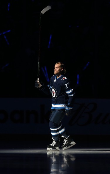 Winnipeg Jets forward Nikolaj Ehlers skates out during player introductions prior to the team's home opener against the Minnesota Wild in Winnipeg on Thurs., Oct. 10, 2019. Kevin King/Winnipeg Sun/Postmedia Network