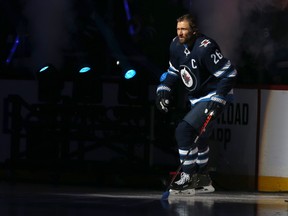 Winnipeg Jets captain Blake Wheeler skates out during player introductions prior to the team's home opener against the Minnesota Wild in Winnipeg on Thurs., Oct. 10, 2019. Kevin King/Winnipeg Sun/Postmedia Network