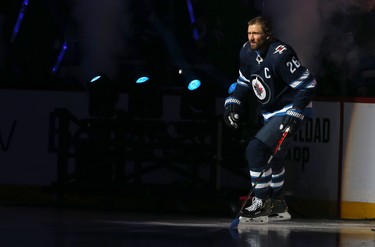 Winnipeg Jets captain Blake Wheeler skates out during player introductions prior to the team's home opener against the Minnesota Wild in Winnipeg on Thurs., Oct. 10, 2019. Kevin King/Winnipeg Sun/Postmedia Network