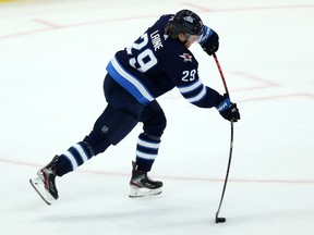 Winnipeg Jets forward Patrik Laine rips a one-timer during a power-play against the Pittsburgh Penguins during NHL action in Winnipeg on Sun., Oct. 13, 2019. Kevin King/Winnipeg Sun/Postmedia Network