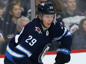 Winnipeg Jets forward Patrik Laine looks to make a play during NHL action against the Pittsburgh Penguins in Winnipeg on Sunday, Oct. 13.