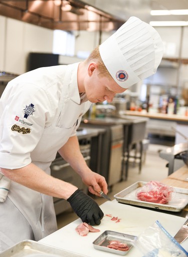 Winnipeg Squash Racquet Club chef Darnell Banman shows off his gold medal-winning culinary skills at the 2019 International Young Chefs Competition held in Calgary on Sept. 20, 2019. Twenty-one of the world’s finest young chefs were chosen for 2019 through selection competitions held in their respective countries. As the gold medallist, Banman received a first place prize of a Superior Cuisine training course at Le Cordon Bleu Paris and an executive chef attaché case with a complete set of professional knives. He also received a set of professional Wüsthof carving knives for his exceptional skills and organization in the kitchen during the competition.