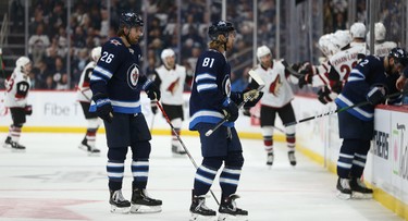 Winnipeg Jets forwards Blake Wheeler (left) and Kyle Connor head to the bench after a Phoenix Coyotes goal during NHL action in Winnipeg on Tues., Oct. 15, 2019. Kevin King/Winnipeg Sun/Postmedia Network