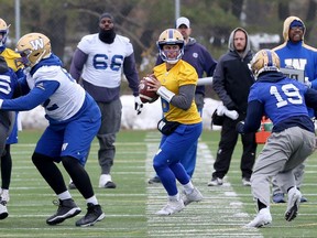 Quarterback Zach Collaros (centre) drops back to pass during Winnipeg Blue Bombers practice on the University of Manitoba campus on Wed., Oct. 16, 2019. Kevin King/Winnipeg Sun/Postmedia Network