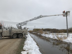 Hydro crews work to repair damage in the Interlake on Sunday, Oct. 20, 2019, left by the winter storm that struck much of Manitoba including the city of Winnipeg. Less than 2,000 customers remain without electricity today as work to repair damage caused by last weekend’s storm continues, Manitoba Hydro said. Supplied/Manitoba Hydro