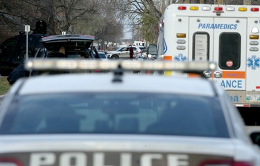 Emergency response vehicles at the scene of an apparent armed and barricaded incident on Pacific Avenue between Ellen and Paulin streets in Winnipeg on Thurs., Oct. 31, 2019. An armoured vehicle, police negotiator and an ambulance on standby were also on scene for what police say came in as an armed robbery call just before 5 a.m. on Thursday morning. Officers could be heard using a megaphone asking people inside the home to come out with their arms in the air. Kevin King/Winnipeg Sun/Postmedia Network