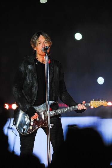 CALGARY, AB - NOVEMBER 24: Keith Urban performs during the half-time show of the 107th Grey Cup Championship Game between the Winnipeg Blue Bombers and the Hamilton Tiger-Cats at McMahon Stadium on November 24, 2019 in Calgary, Alberta, Canada.  (Photo by Derek Leung/Getty Images)