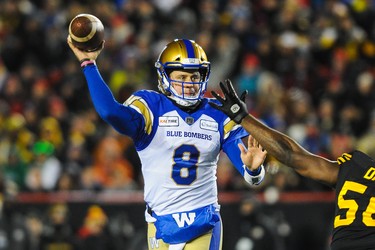 CALGARY, AB - NOVEMBER 24: Zach Collaros #8 of the Winnipeg Blue Bombers passes against the Hamilton Tiger-Cats during the 107th Grey Cup Championship Game at McMahon Stadium on November 24, 2019 in Calgary, Alberta, Canada. (Photo by Derek Leung/Getty Images)