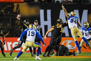 CALGARY, AB - NOVEMBER 24: Dane Evans #9 of the Hamilton Tiger-Cats passes against the Winnipeg Blue Bombers during the 107th Grey Cup Championship Game at McMahon Stadium on November 24, 2019 in Calgary, Alberta, Canada. (Photo by Derek Leung/Getty Images)