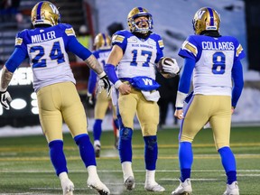 Winnipeg Blue Bombers Chris Streveler celebrates with his team during the CFL's West Division semifinal against Calgary Stampeders at McMahon Stadium on Sunday, November 10, 2019. Azin Ghaffari/Postmedia Calgary