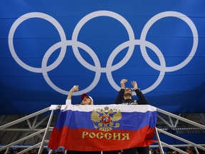 Russian fans cheer during the quarterfinal round of the men's hockey game between Russia and Norway at the 2018 Winter Olympics in Gangneung, South Korea, Feb. 21, 2018. (AP Photo/Jae C. Hong)