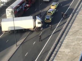 The scene on London Bridge in the aftermath of a reported shooting, in London, Nov. 29, 2019 in this still image obtained from a social media video. (LUKE POULTON via REUTERS)