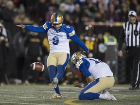 Winnipeg Blue Bombers kicker Justin Medlock boots one of his six field ghoals against the Hamilton Tiger-Cats during the 107th Grey Cup in Calgary, Alta., Sunday, November 24, 2019. THE CANADIAN PRESS/Frank Gunn